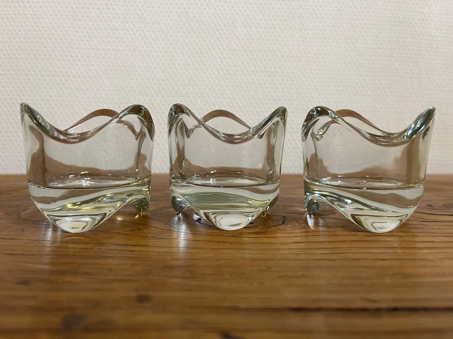 Trio of thick glass tea light candle holders