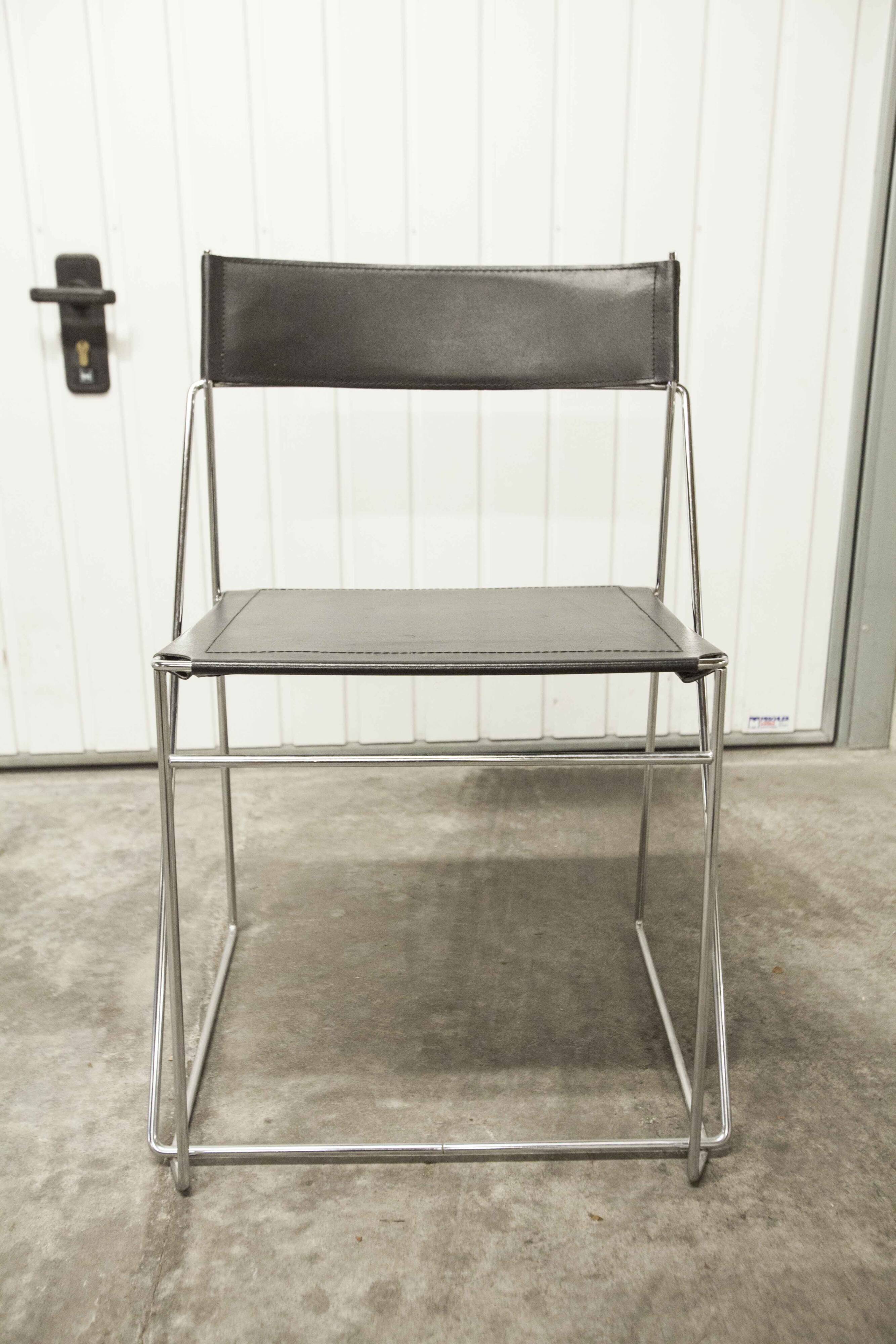 Set of 3 minimalist X line chairs by Niels Jorgen Haugesen.