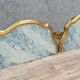 Pair of Louis XV style wall consoles in gilded wood