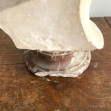 Plaster bust on marble stand