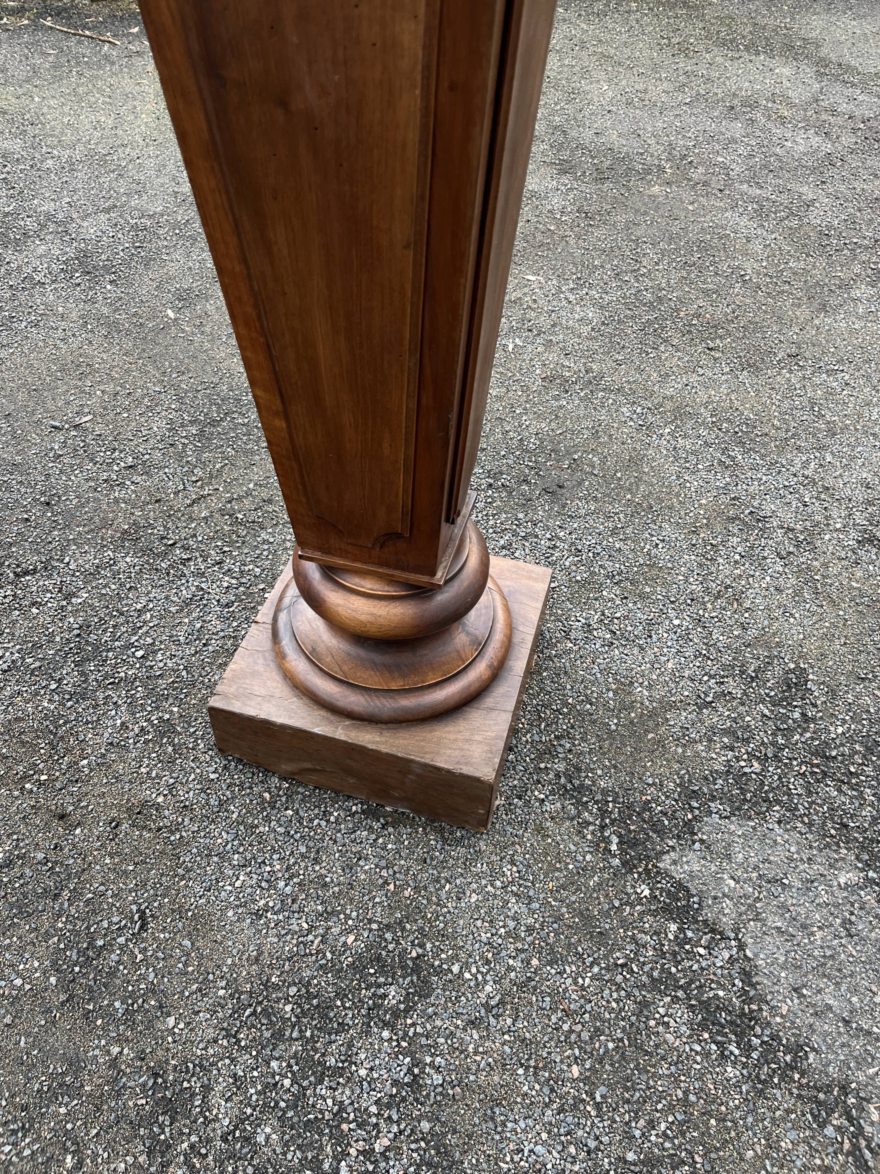 Large wooden and marble column/sheath