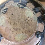 Three stoneware empty pockets with blue drips