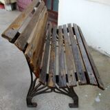 Small garden bench, with cast iron legs.