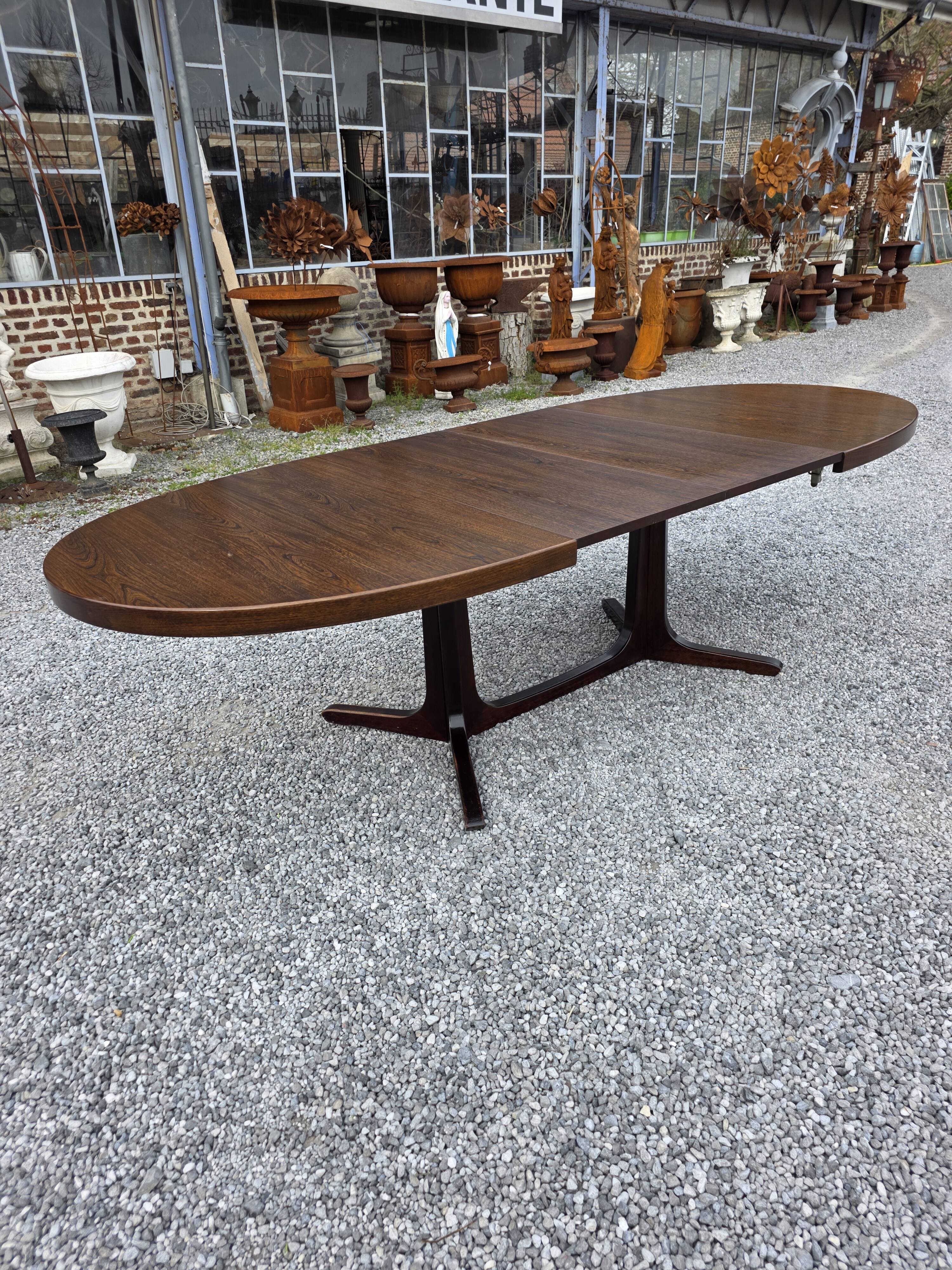 Extensible Baumann table in oak from the 1960s.
