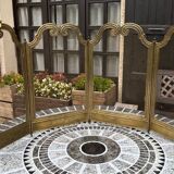 Old brass fireplace screen
