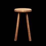 Antique solid wood four-legged stool – rustic & decorative piece