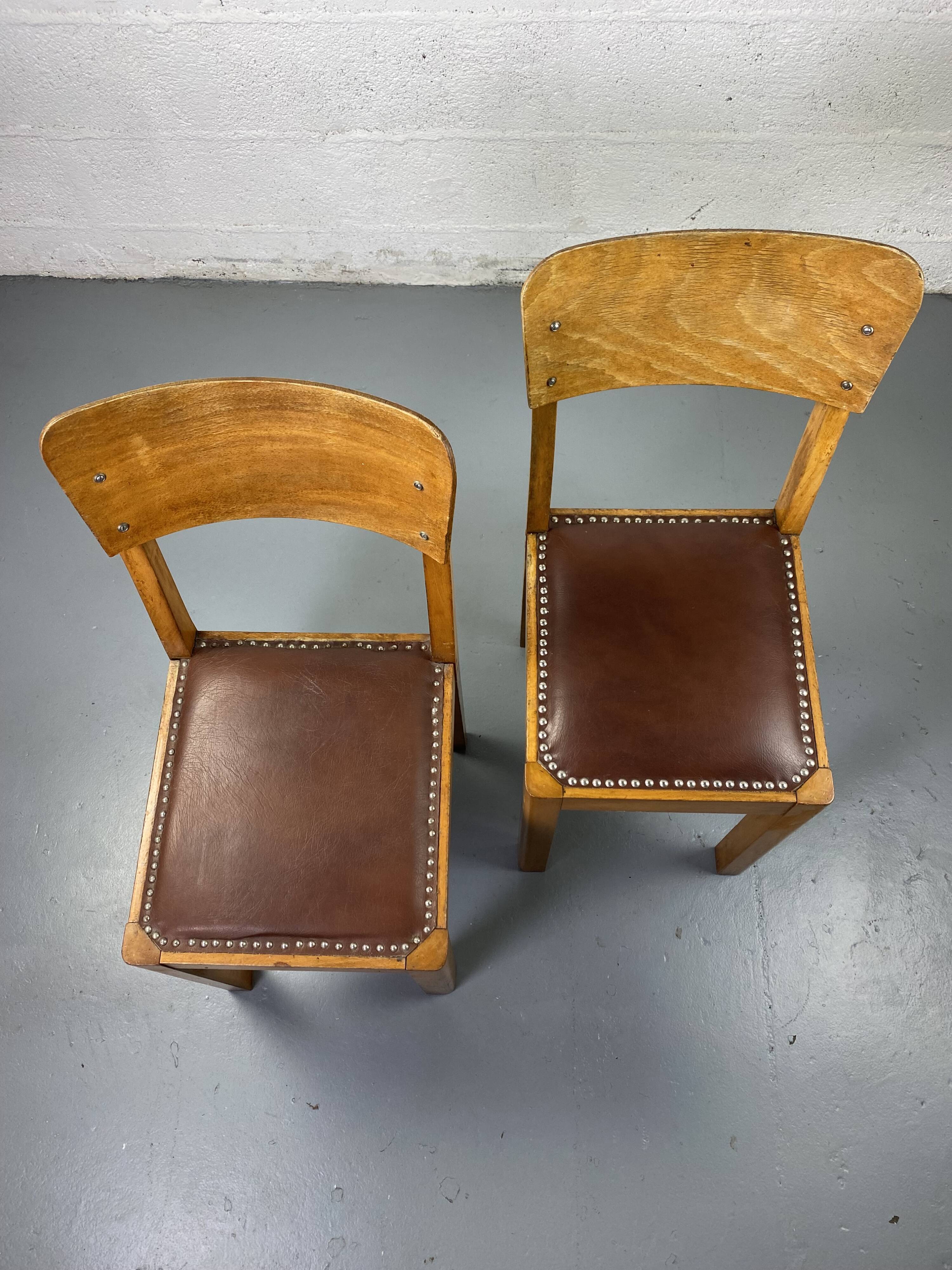 Wooden and leather chairs