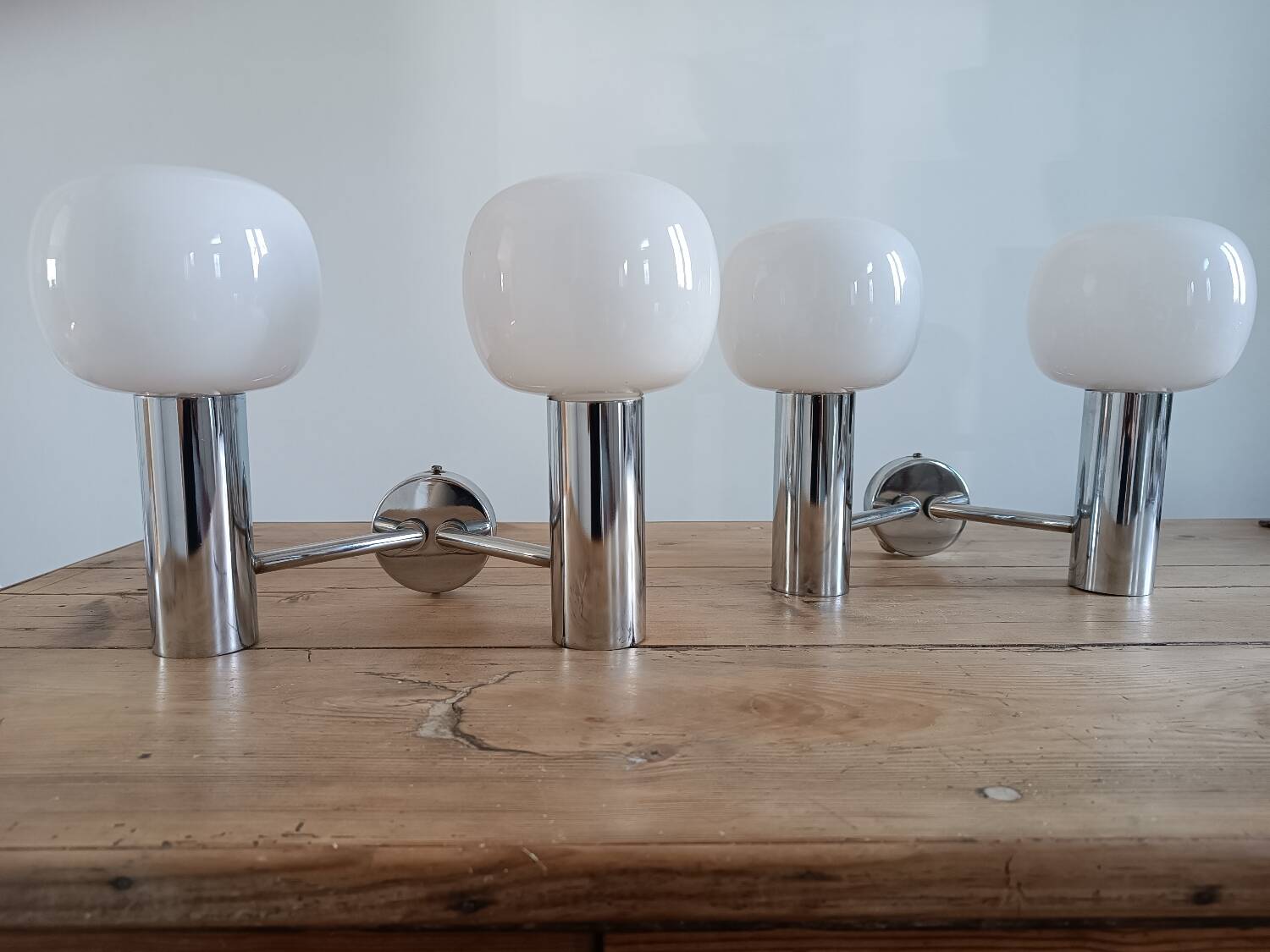Pair of vintage wall lights in chromed metal and opaline 1970