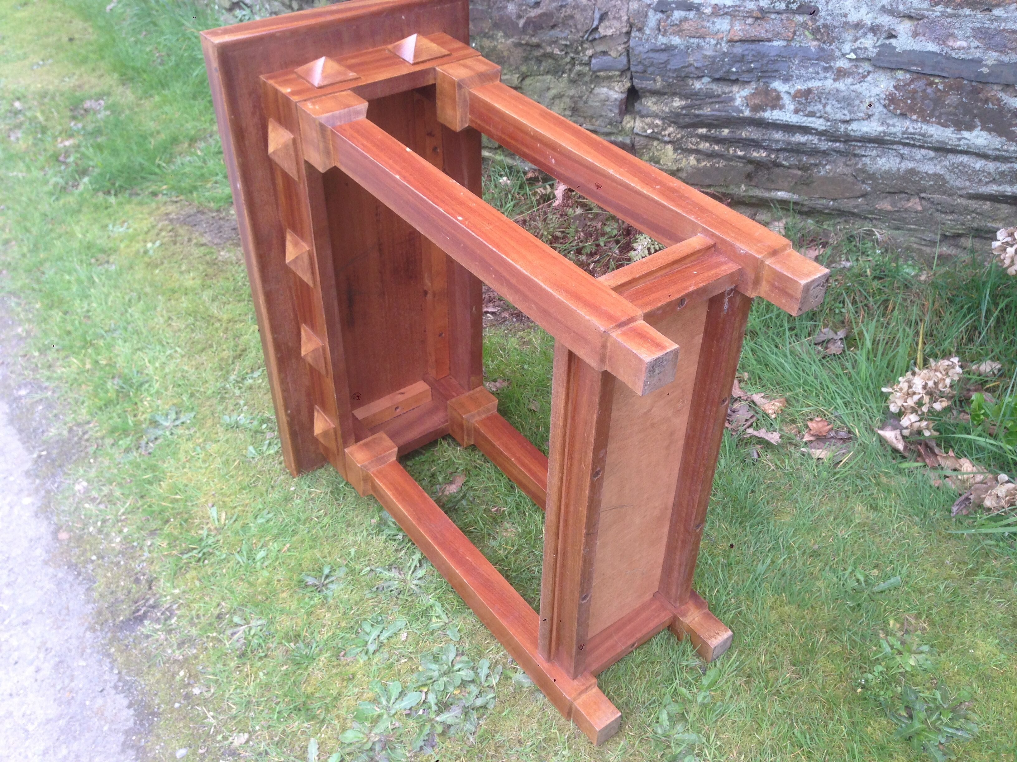 Art deco console in solid mahogany with diamond tips.