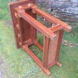 Art deco console in solid mahogany with diamond tips.