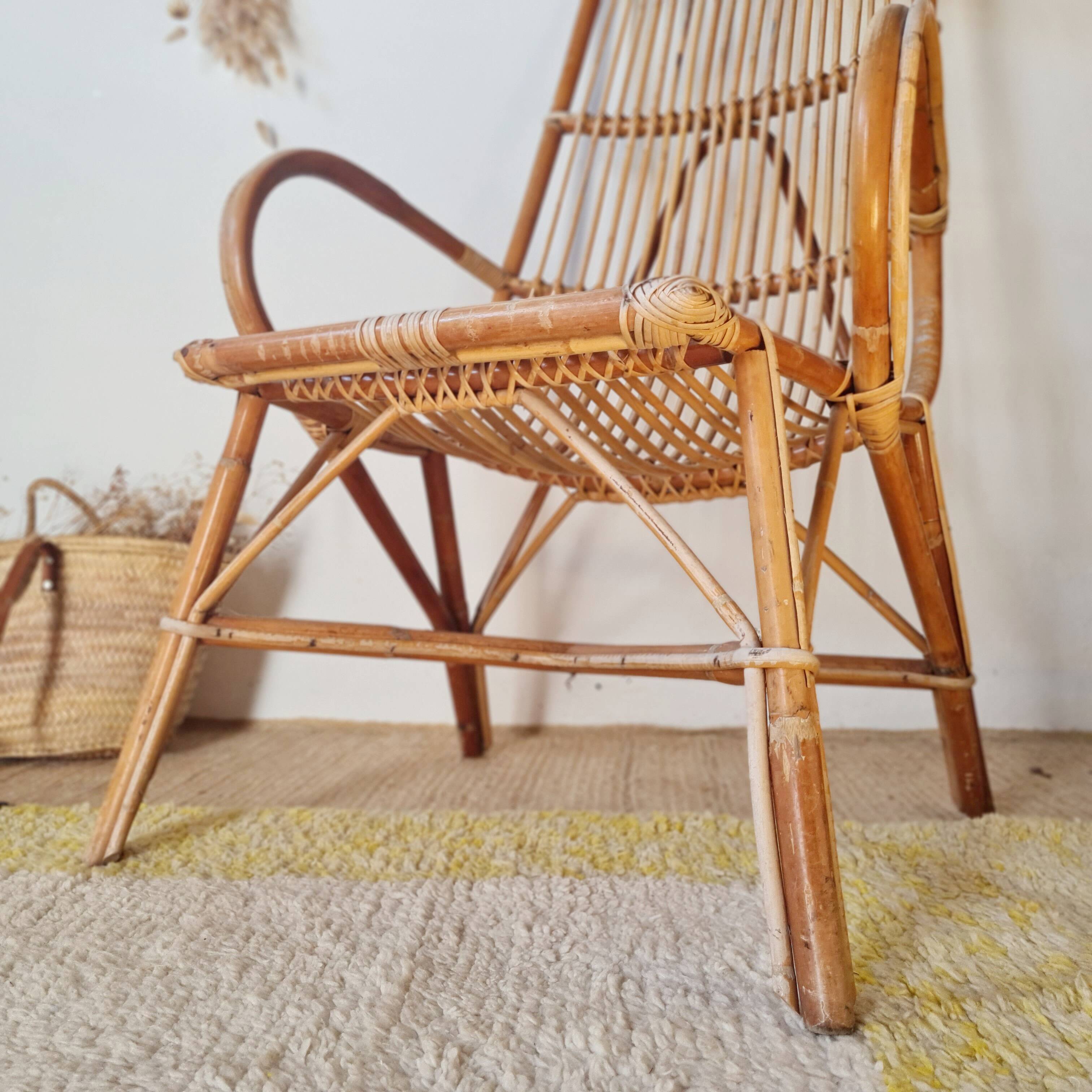 Fauteuil ancien en rotin large dossier
