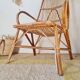 Fauteuil ancien en rotin large dossier