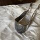 Antique sugar tongs in its case, shell decoration.