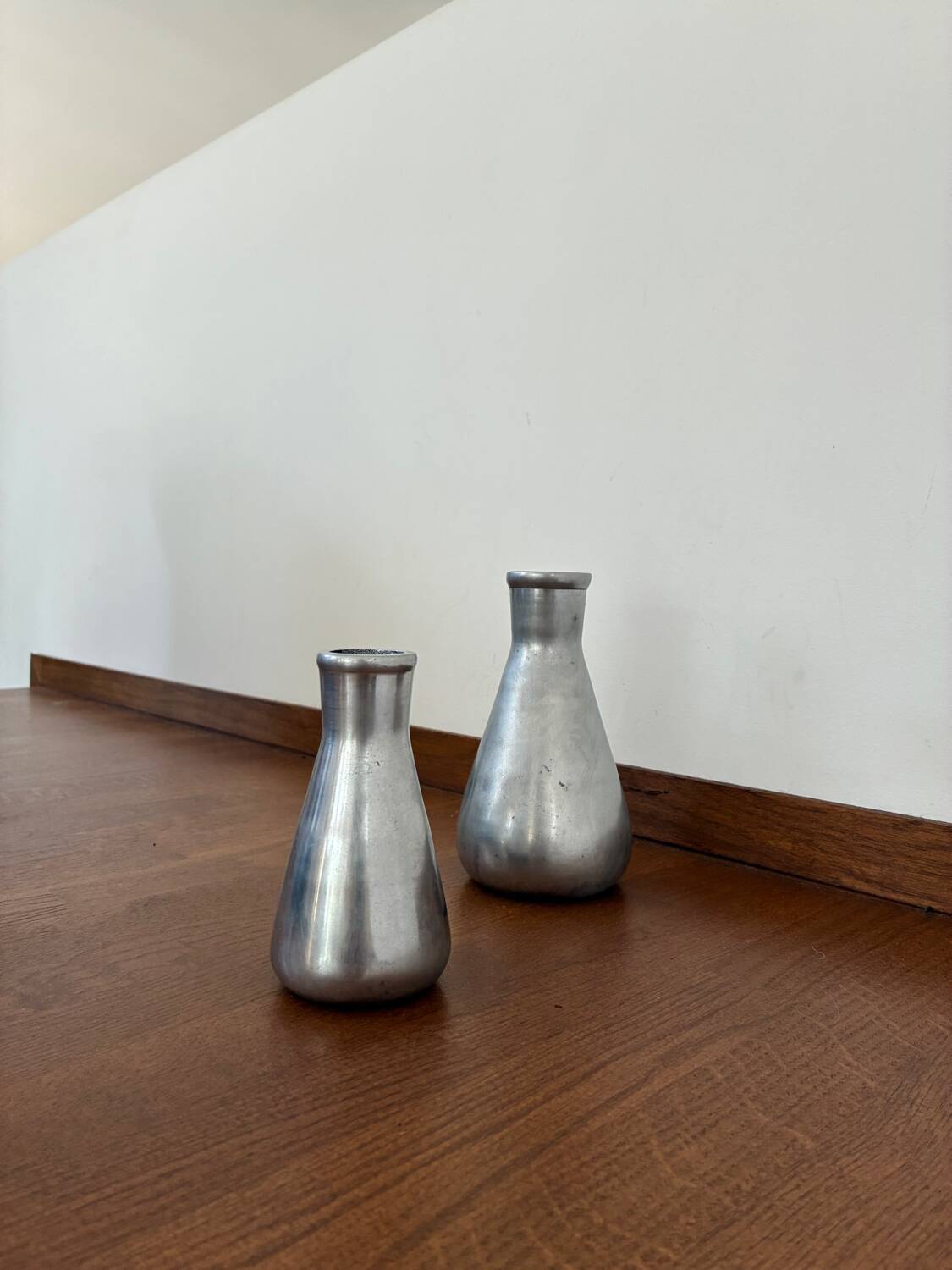 Vintage pair of chrome vases from the 1970s.