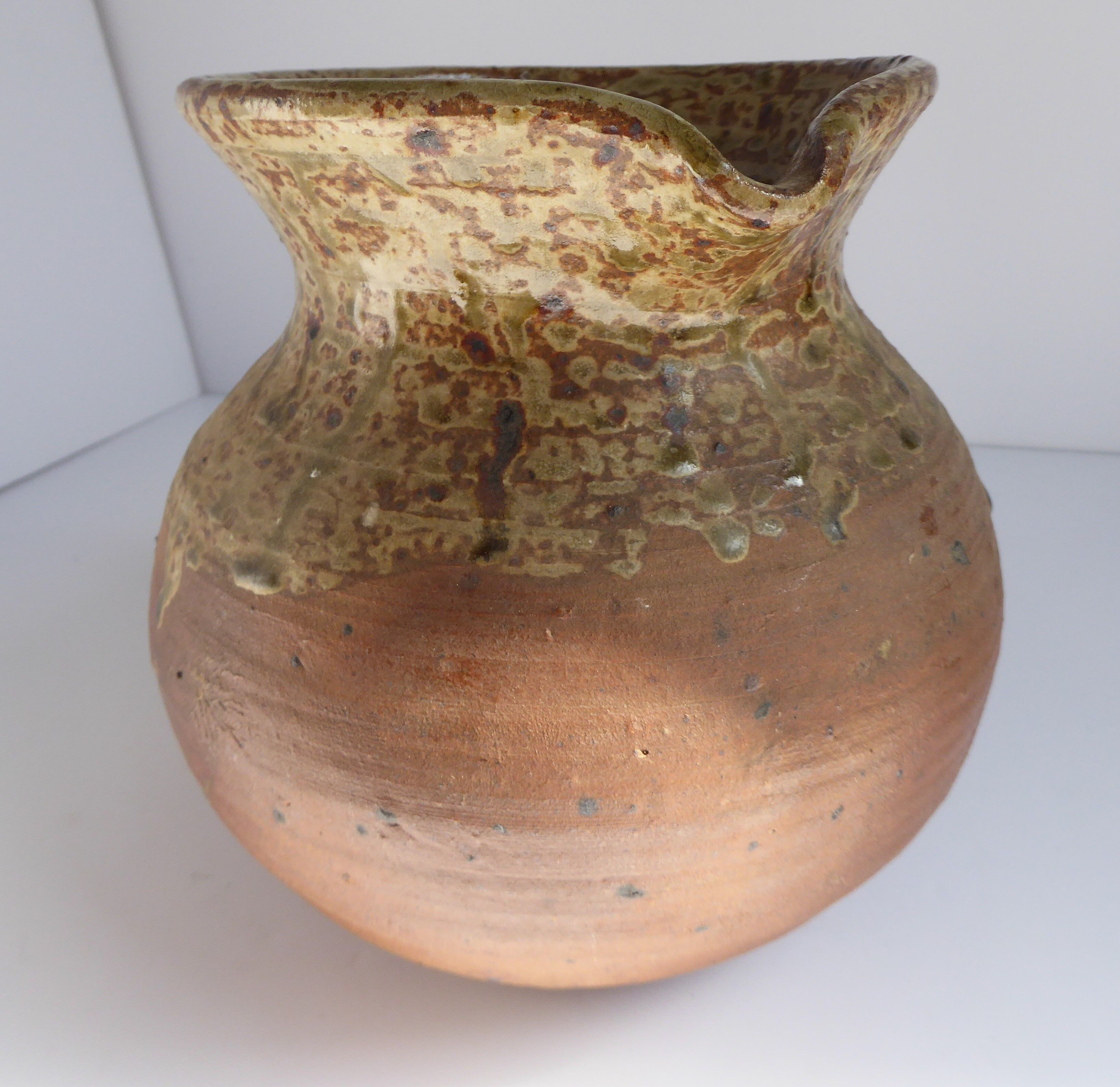 Signed vernissé sandstone pitcher