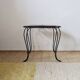Small coffee table from the 1950s in wrought iron and glazed ceramic.