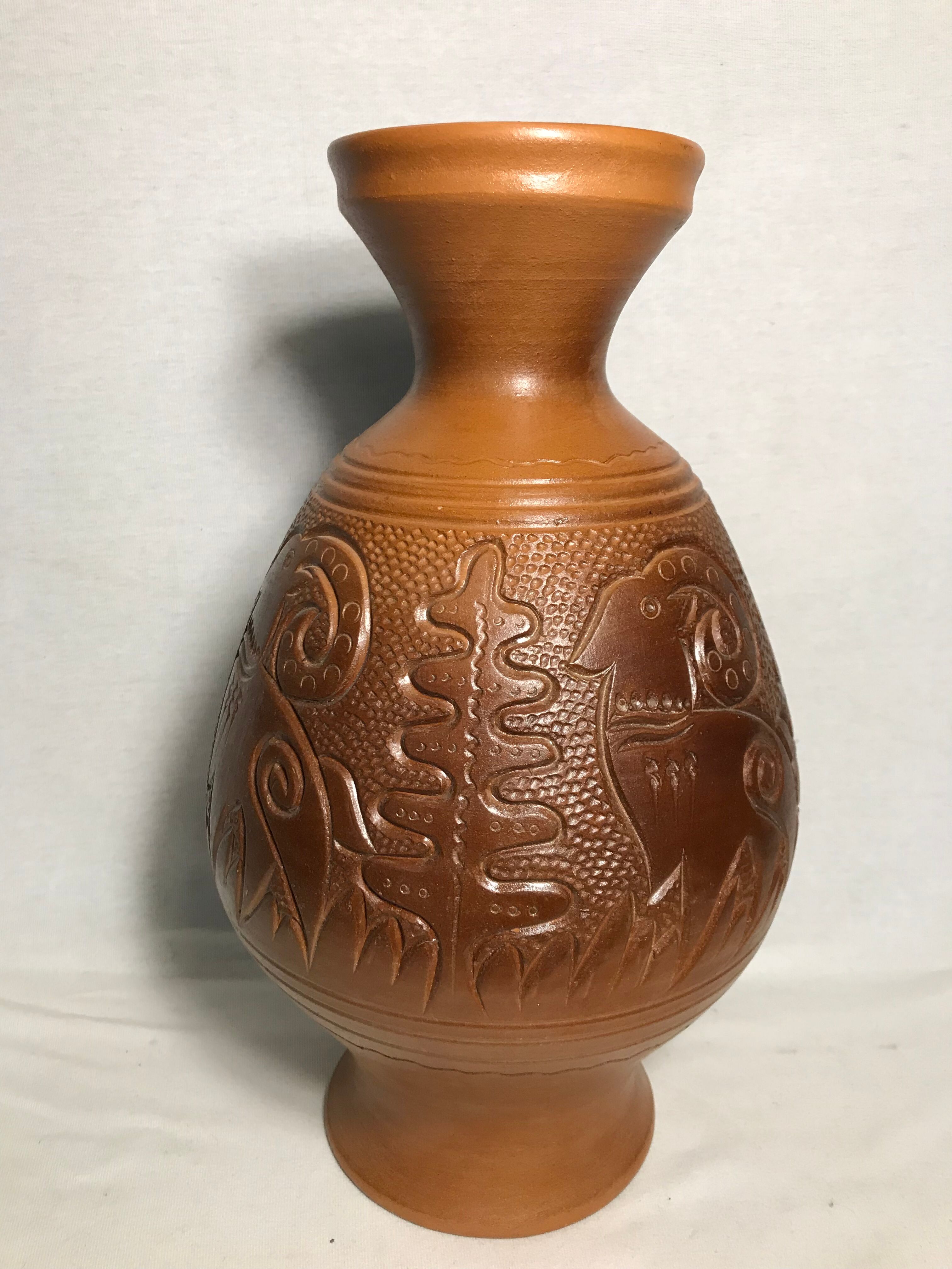 Old terracotta vase carved interior black vintage