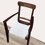 Scandinavian chair in wood and woven natural fibre.