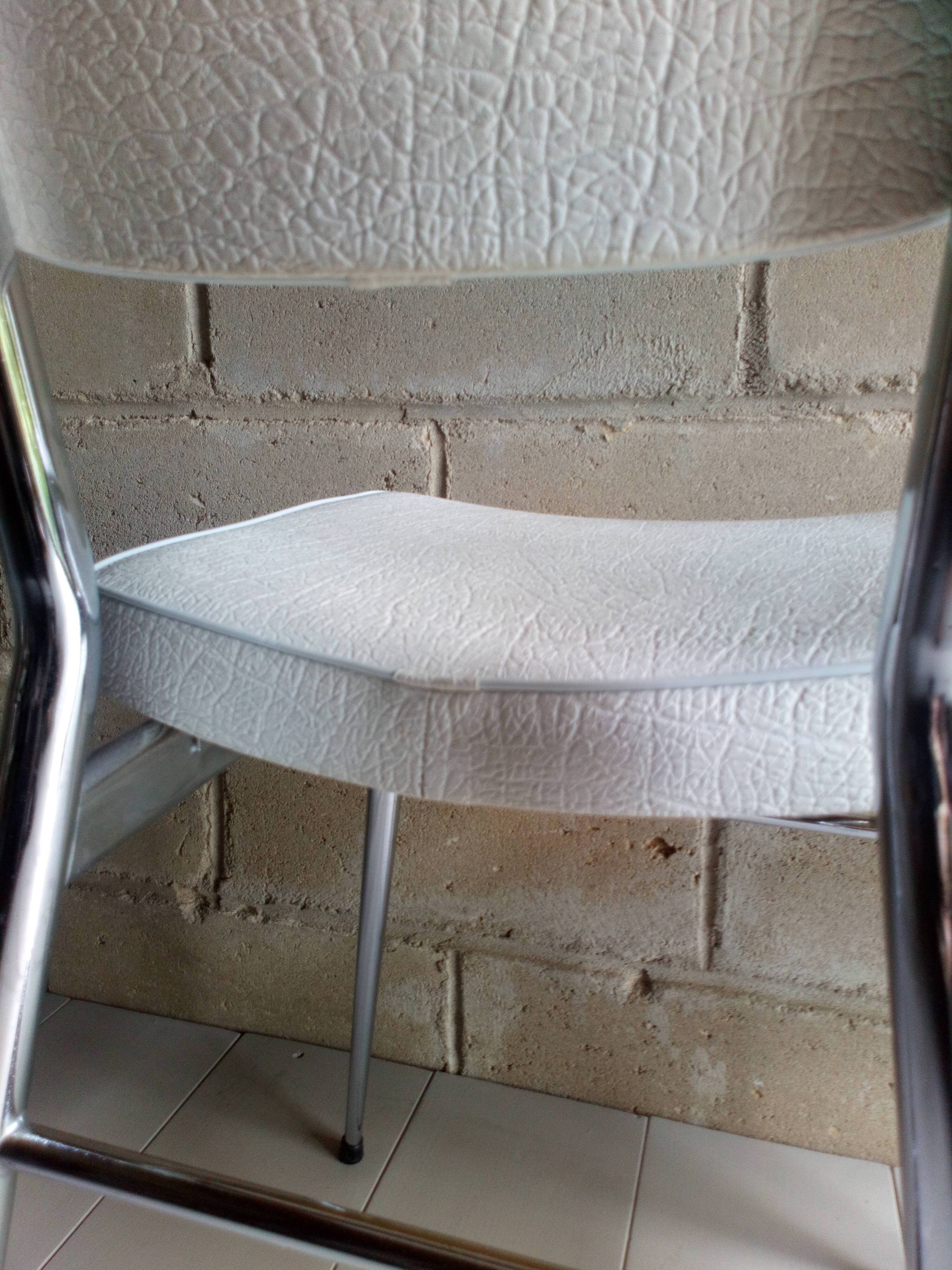 Pair of chrome and white 1960 skaï chairs