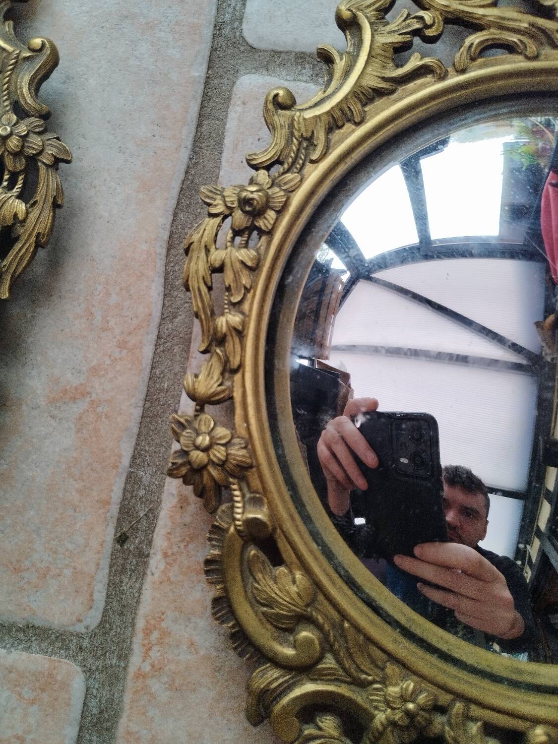 Pair of antique witch mirrors, curved glass, bronze frame