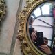 Pair of antique witch mirrors, curved glass, bronze frame