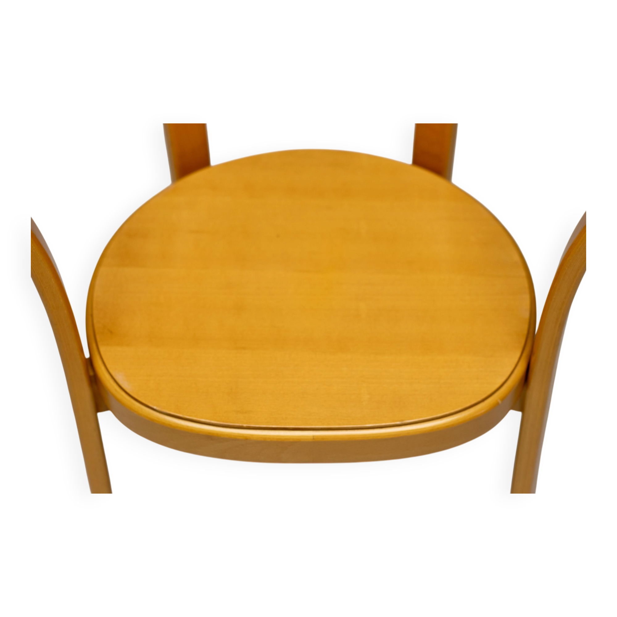 Stackable chairs in curved beech.