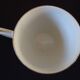 Set of six Art Deco white fine porcelain coffee cups and saucers