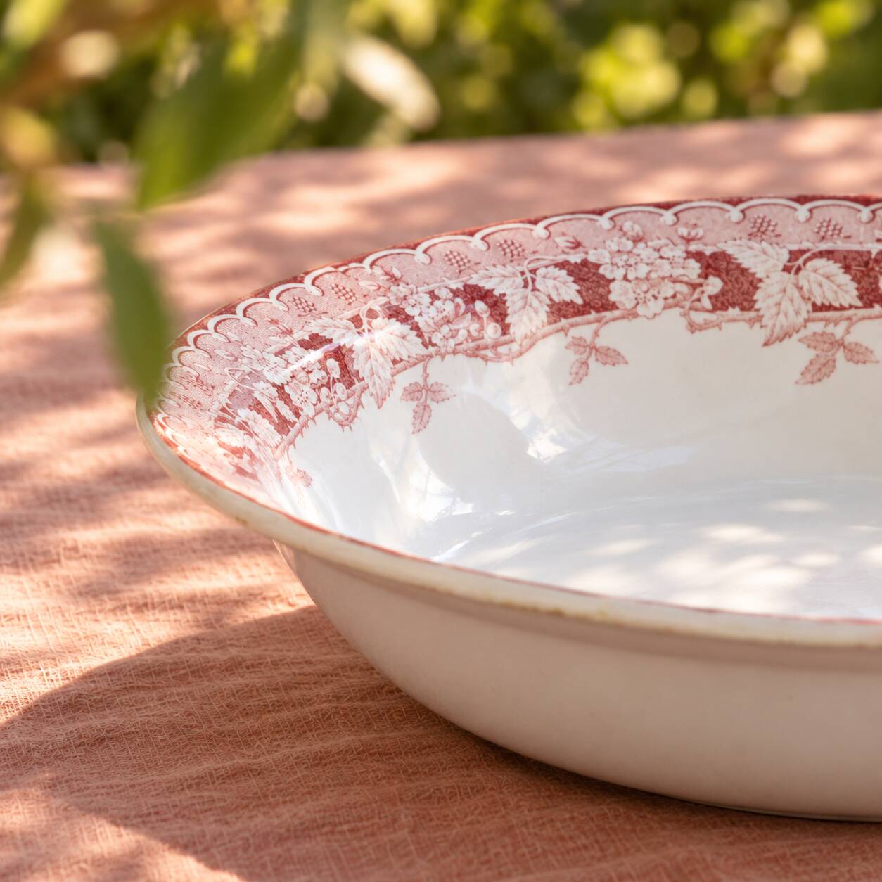 Pink ironstone salad bowl signed St Amand, Mûrier collection.