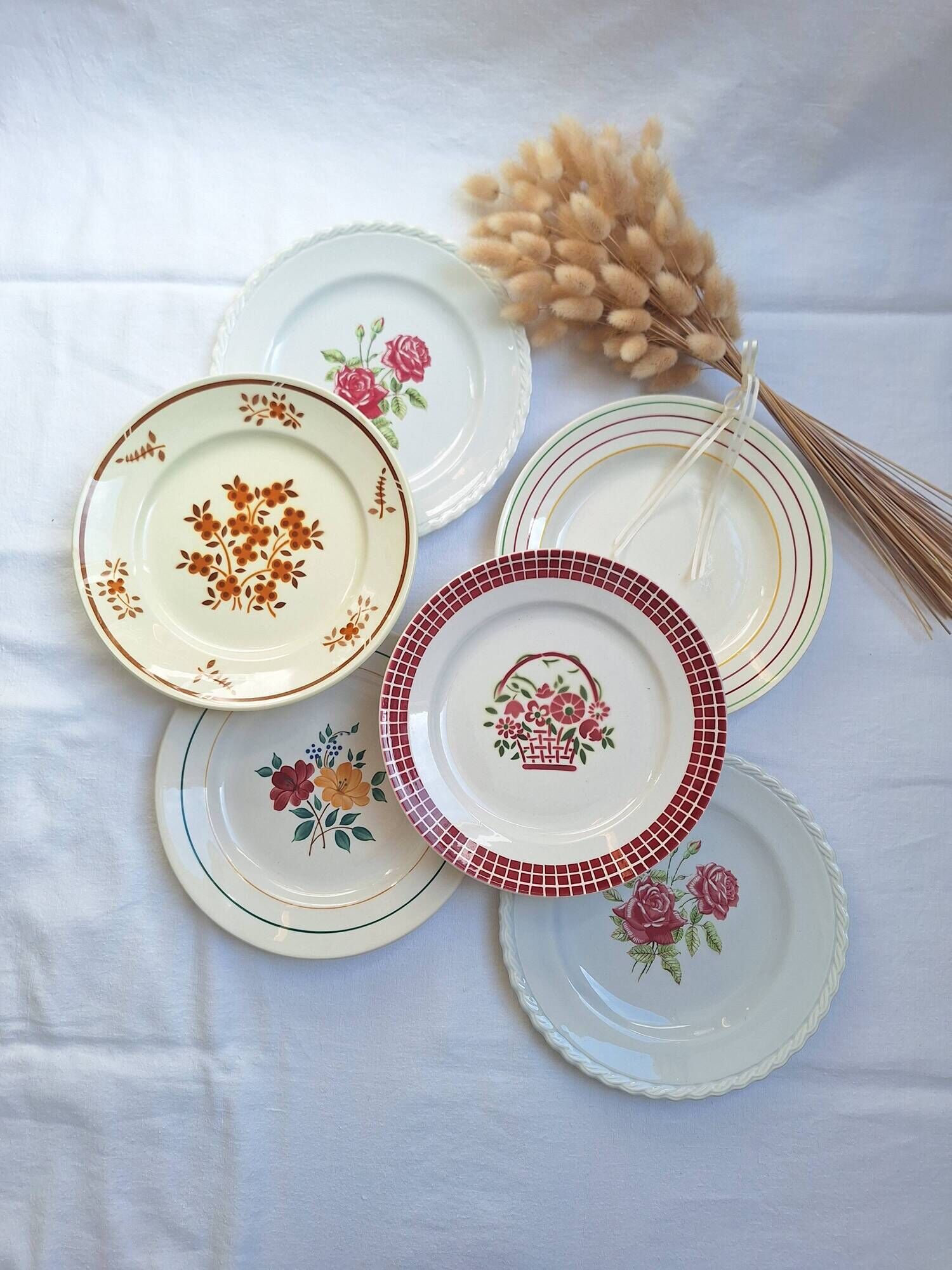 Multicolored flower dinner plates from Moulin des Loups, St Amand and Badonville