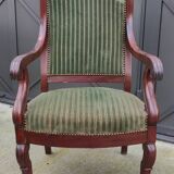 Fauteuil en velours vert