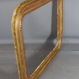 Old frame with doucine gilded stucco wood