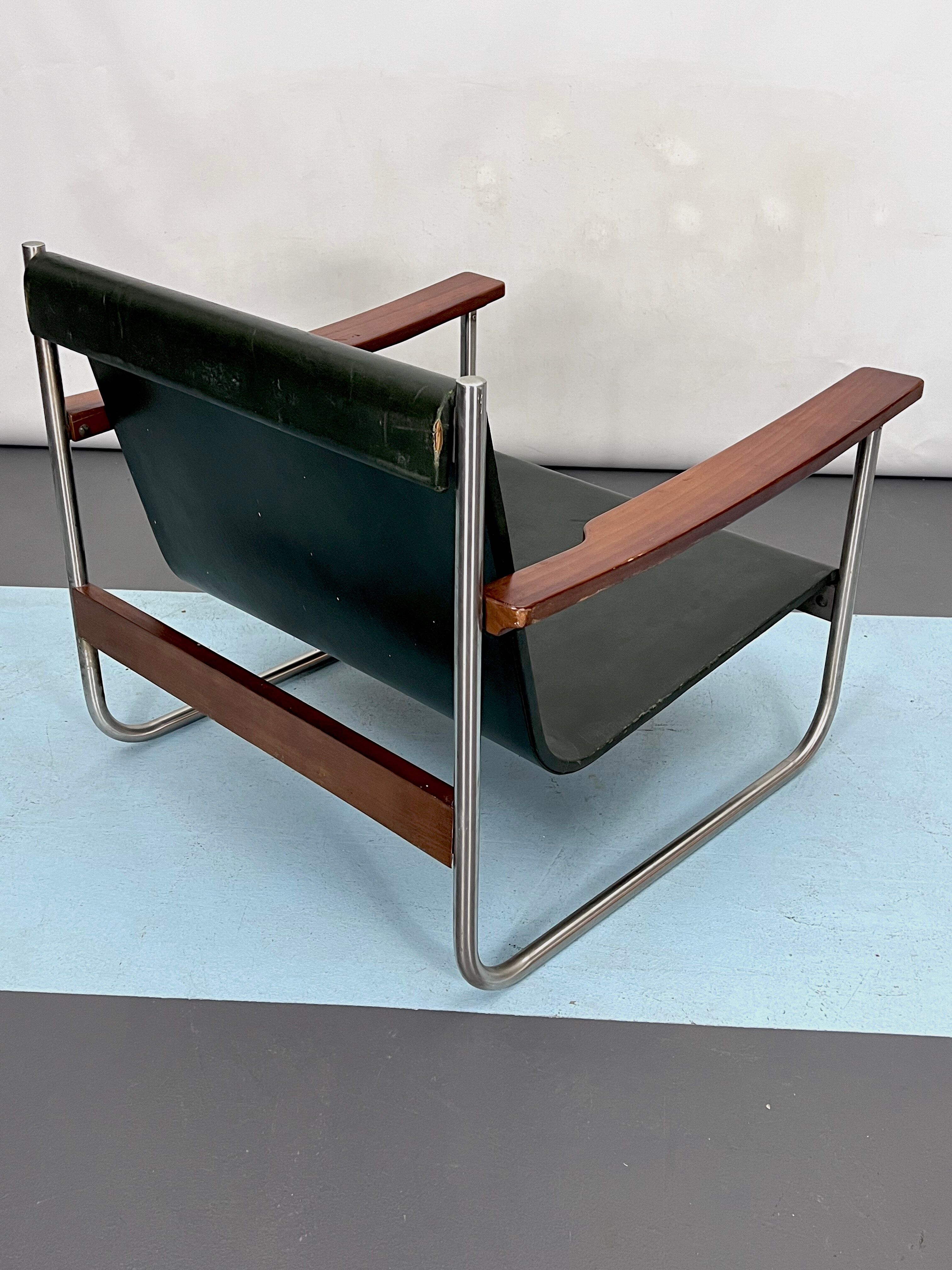 Fauteuil lounge vintage italien chrome et cuir des années 60