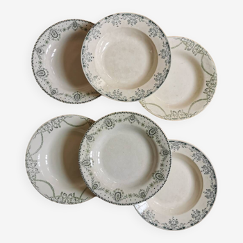 Old mismatched soup plates, iron earth