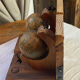 Pair of wooden bookends, rotating globes