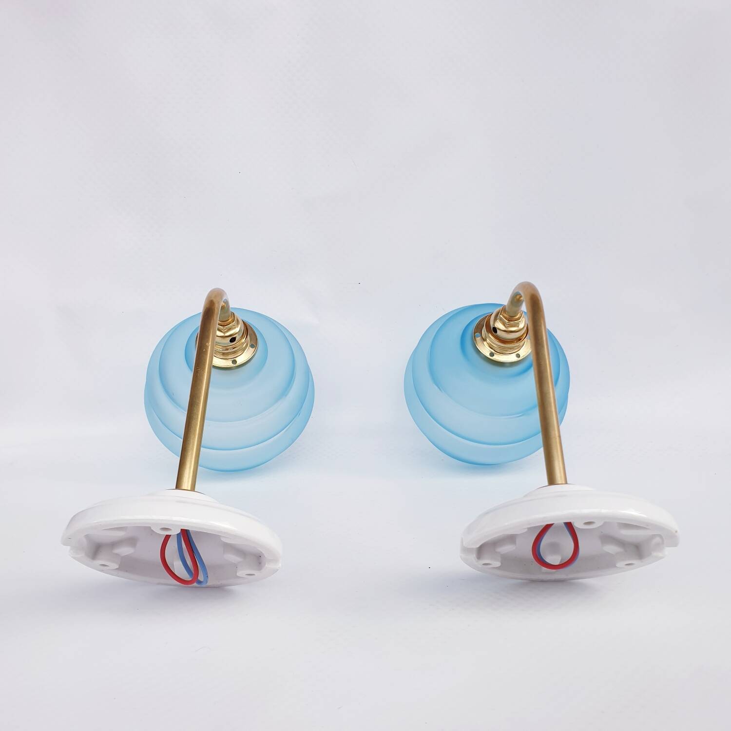 Vintage brass and blue glass wall lights