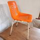 Chair with openwork plastic shell 1970