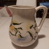 Moustiers style floral motif earthenware pitcher signed