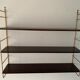 String wall shelf in wood and brass, 1960