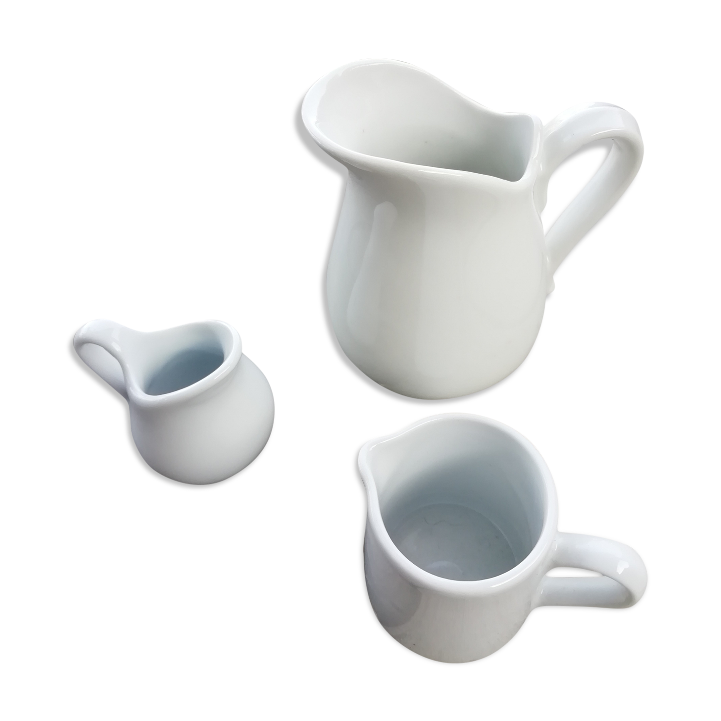 Trio of milk pot in white porcelain