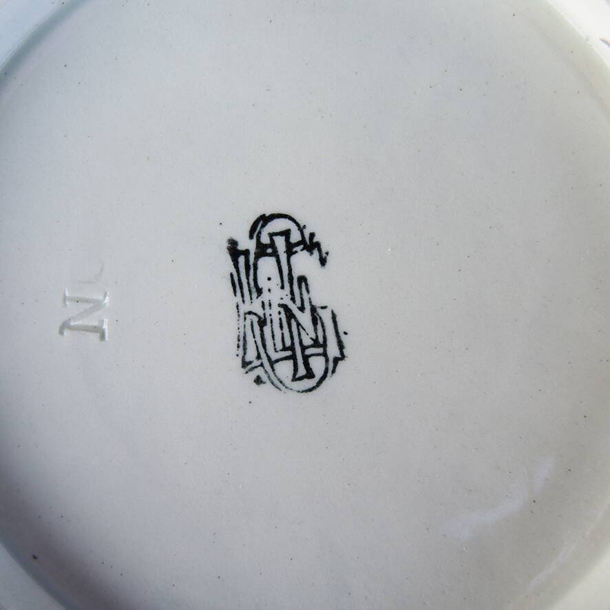 Antique ceramic saucer from Gien – Cornucopia