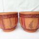 Duo of vintage braided wicker pot cover