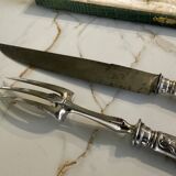 Leg cutlery set. Silver handles.