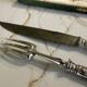 Leg cutlery set. Silver handles.