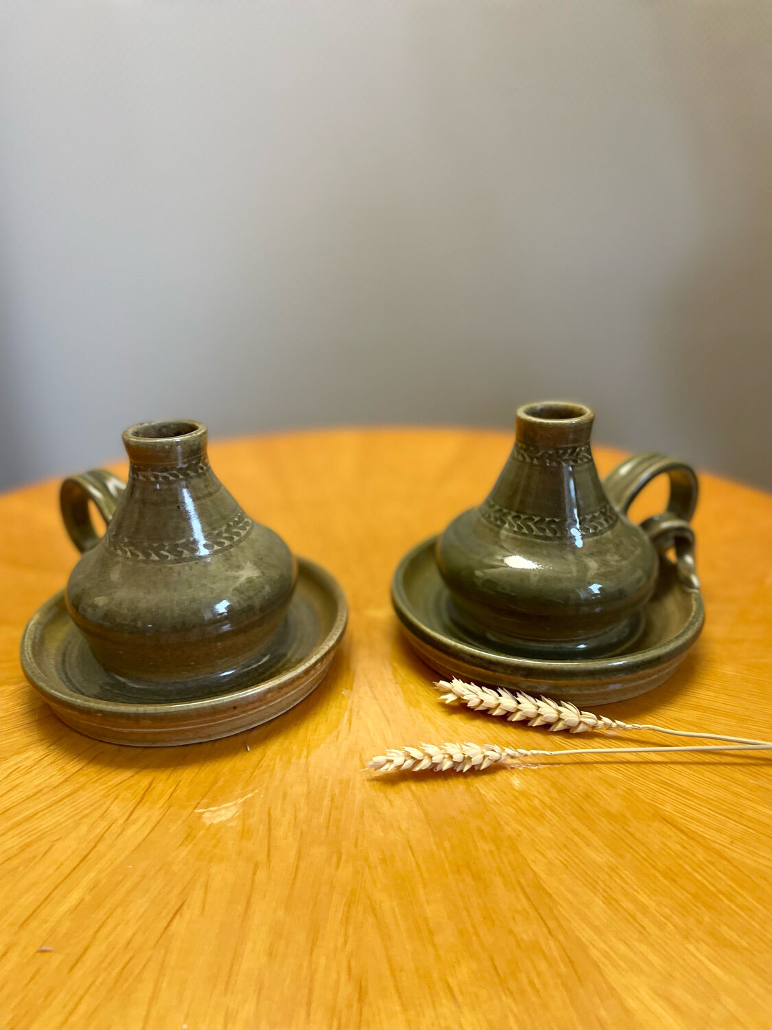Pair of vintage glazed stoneware candle holders