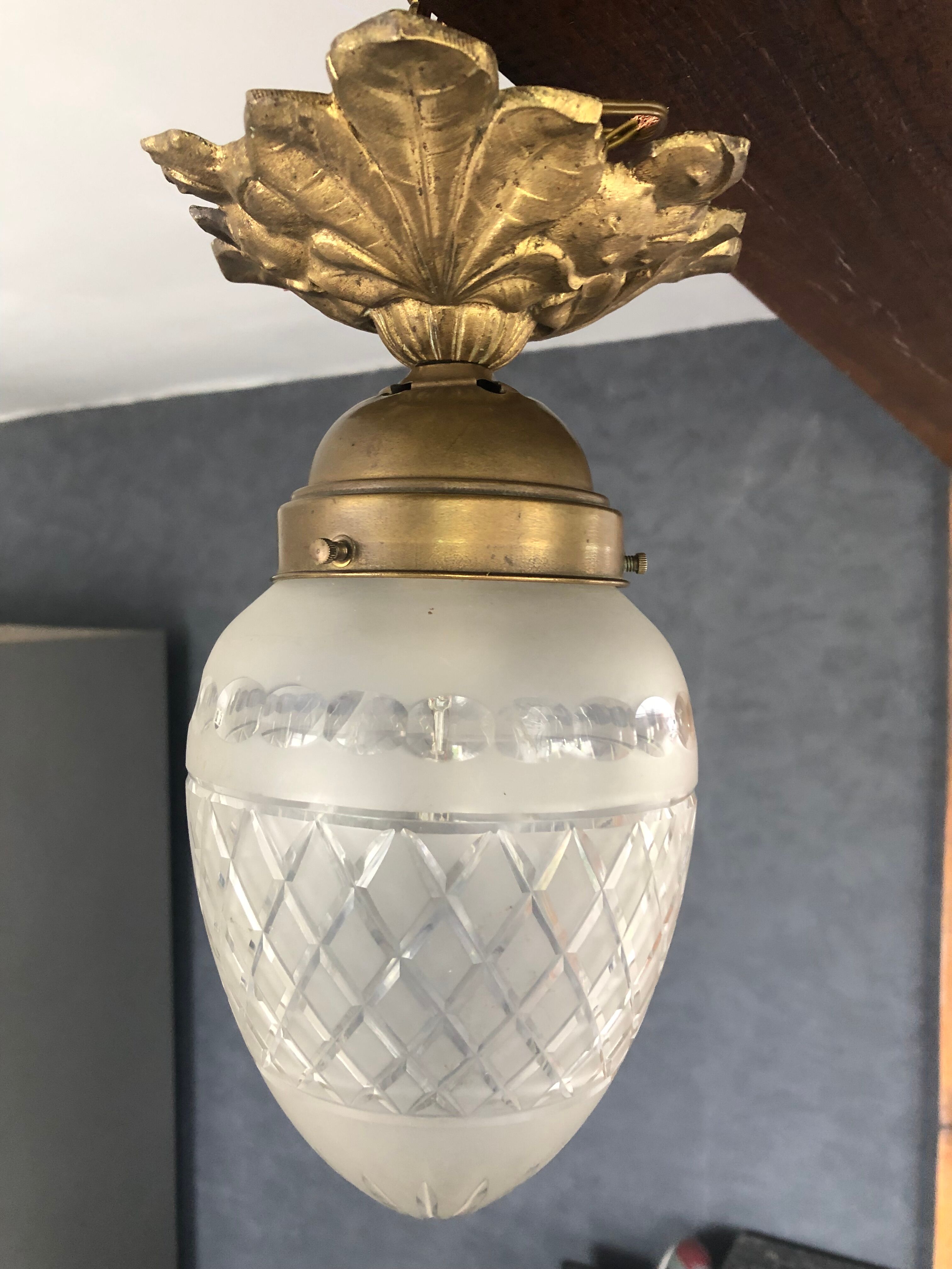 Bronze ceiling lamp and glassware