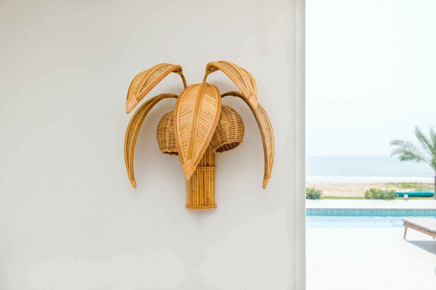 Pair of coconut / palm sconces in natural rattan