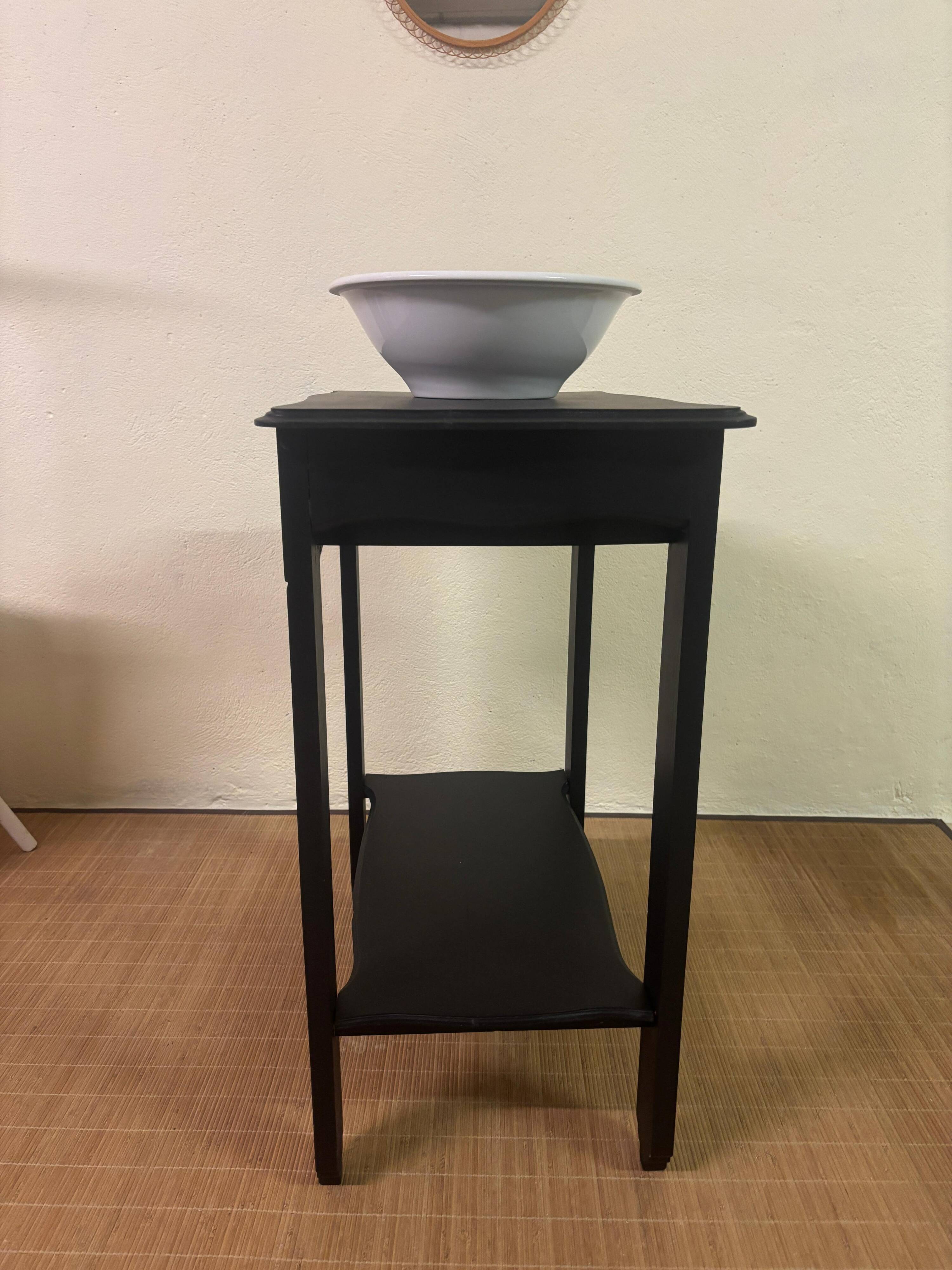 Small Art Deco console reinterpreted – matte black wood with drawer