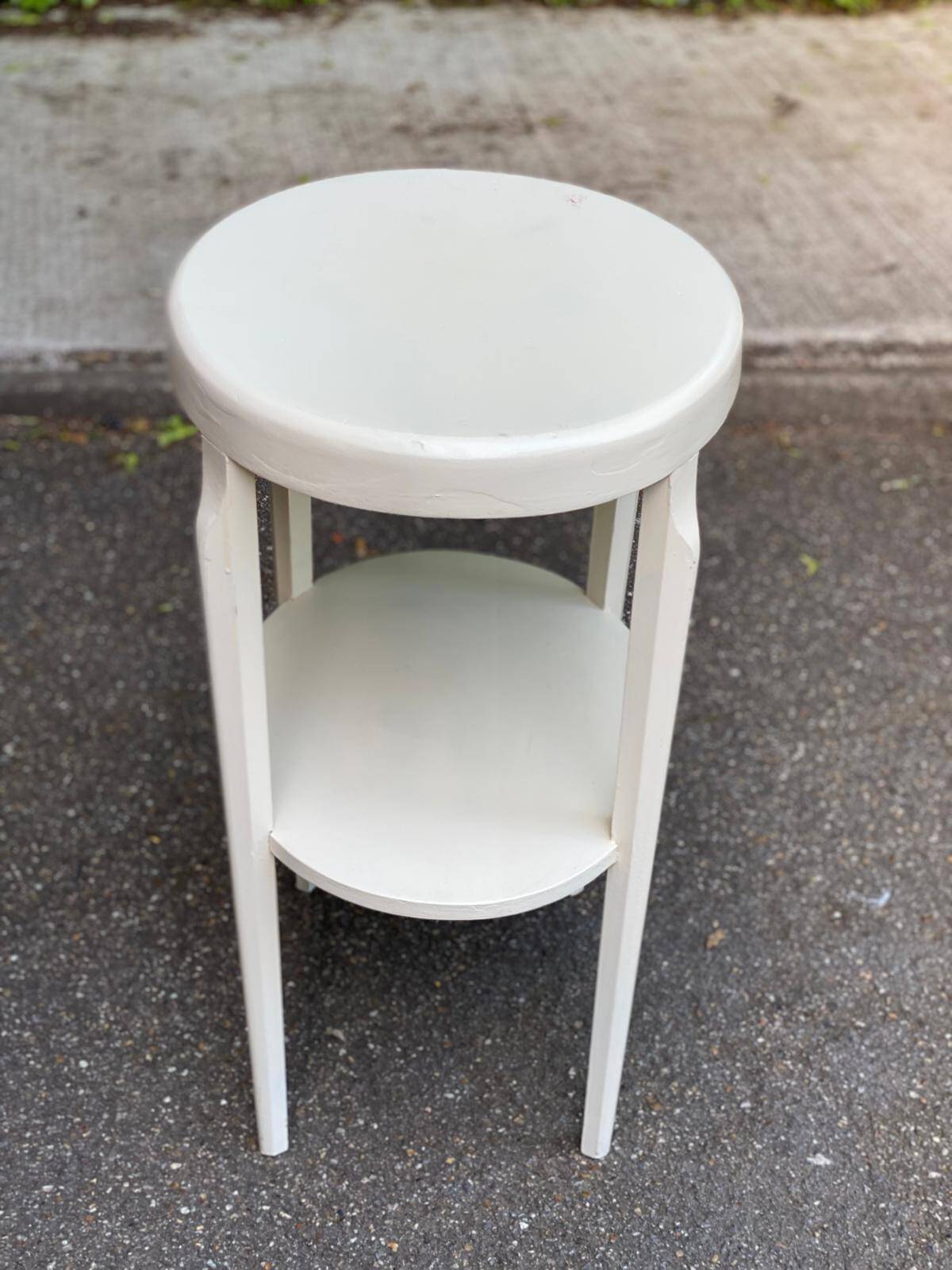 Vintage solid wood stool painted in beige.