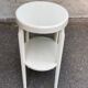 Vintage solid wood stool painted in beige.