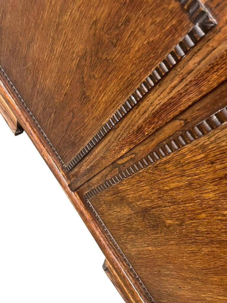 Vintage wooden display cabinet with textured glass.